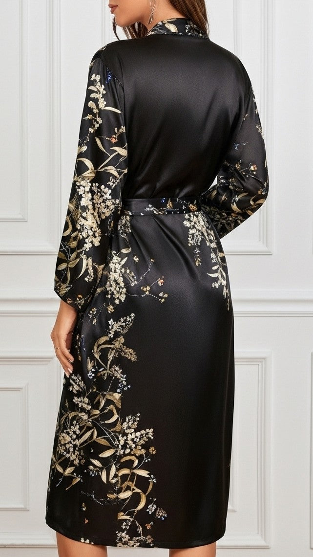 costas robe floral preto com faixa passada nos passadores barra midi e acabamento limpo